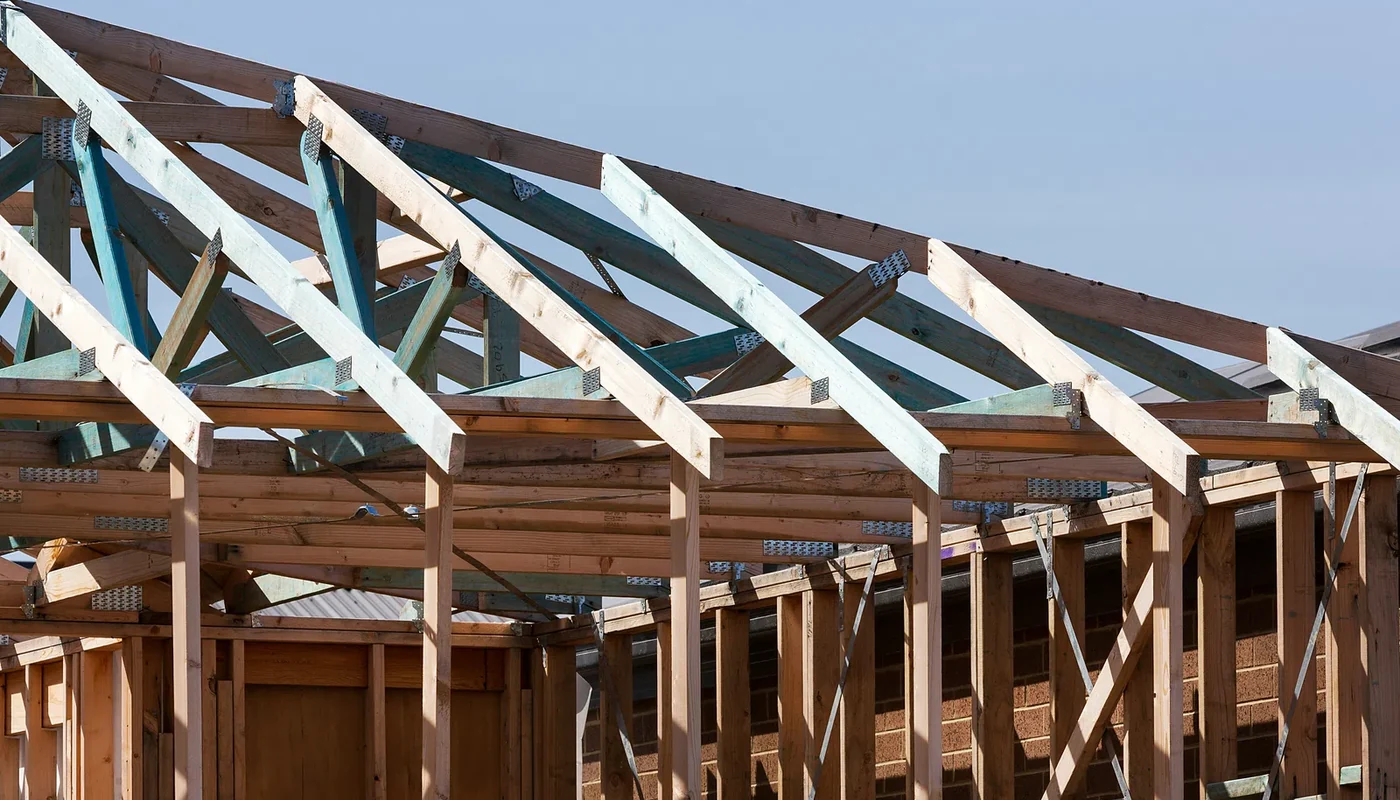Exposed roof trusses showing structural details that a solar proposal should address