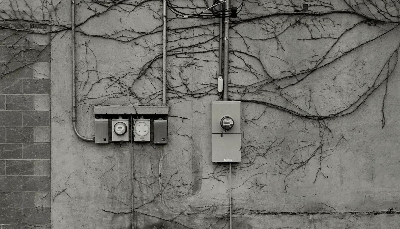 Electricity meter mounted on an exterior wall for ongoing energy monitoring