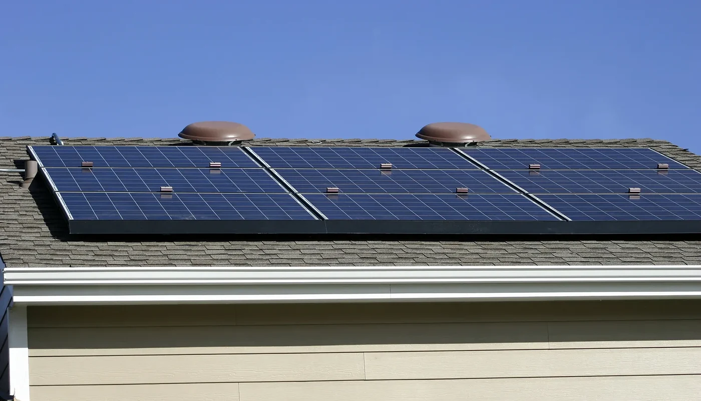 Residential rooftop solar array showing roof pitch, direction, and nearby obstructions
